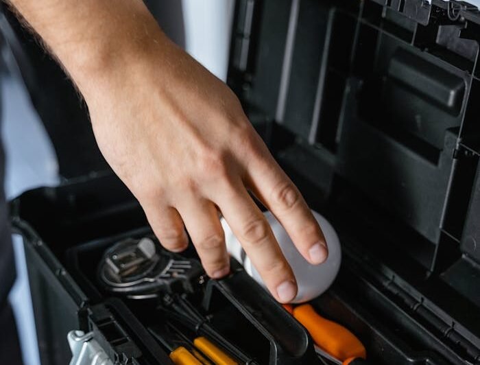 NYC electrician inspecting electrical panel — residential and commercial service