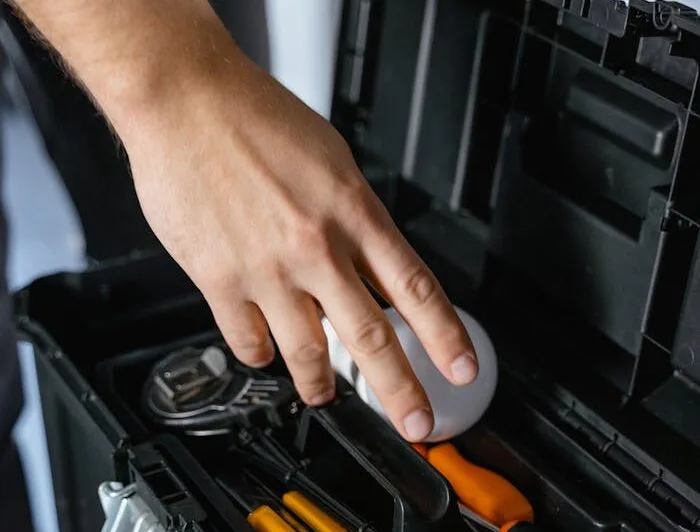 NYC electrician inspecting electrical panel — residential and commercial service