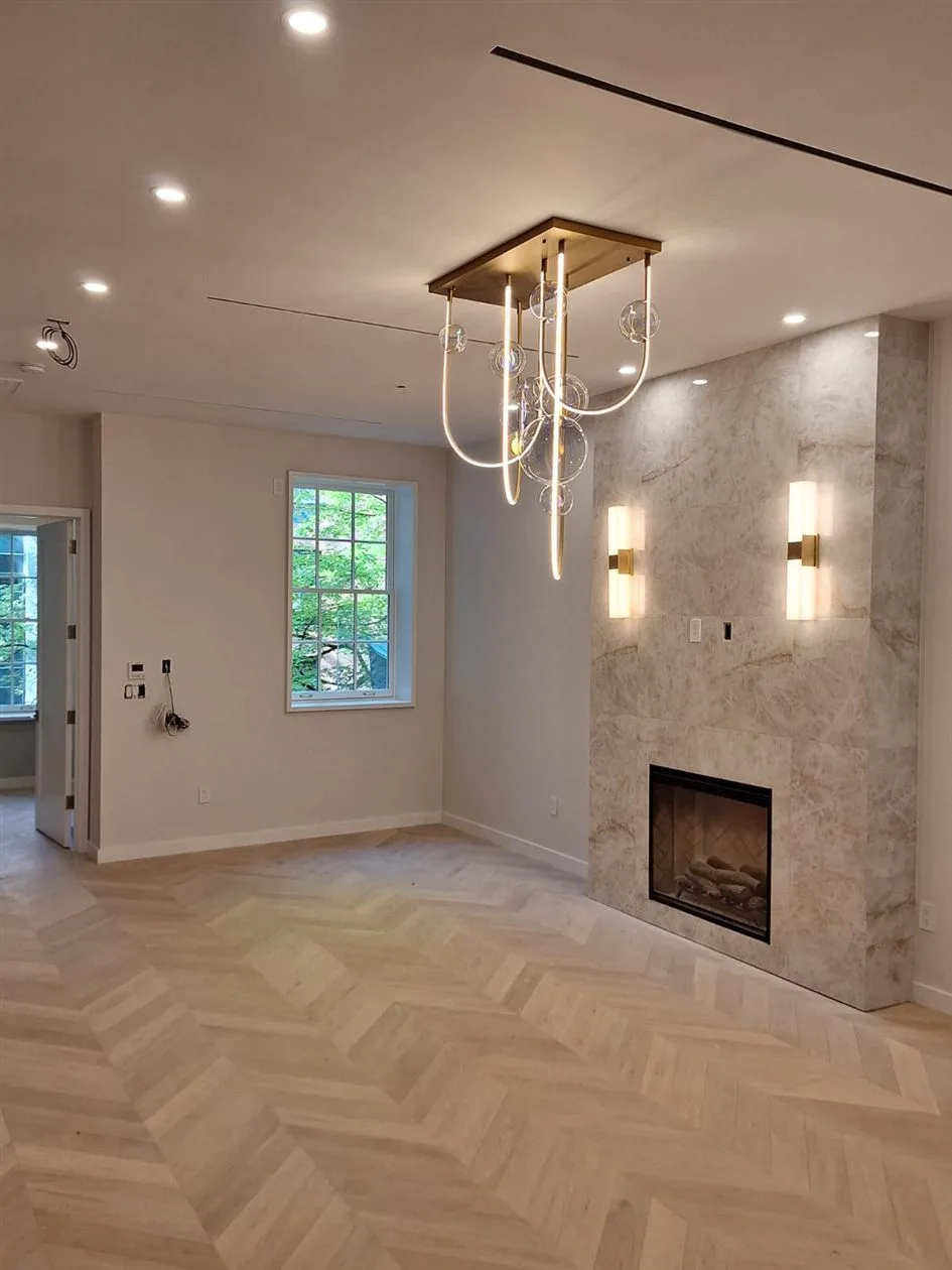 Complete electrical wiring and lighting installation in private Brooklyn house — chandelier, wall sconces, and recessed lighting by AE Electric