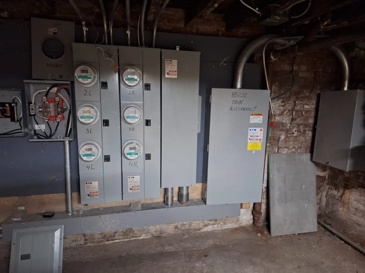 Multi-family building electrical panels and meters installed by AE Electric NYC