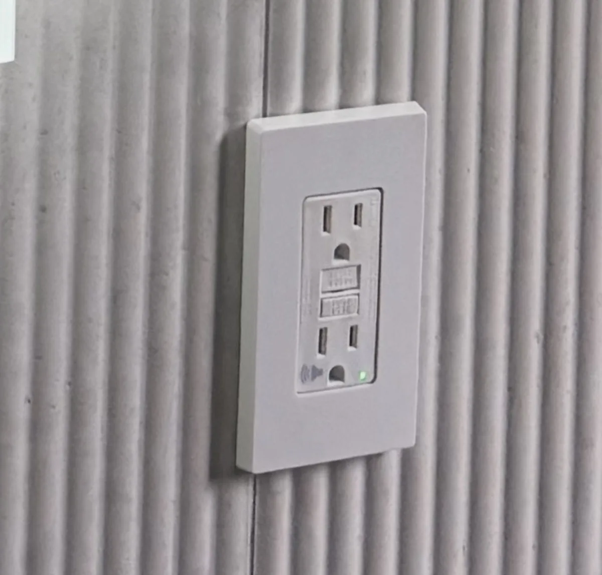 GFCI outlet installed in a new bathroom in Brooklyn, NYC by AE Electric